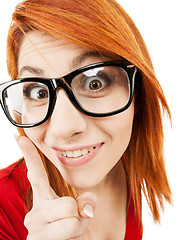 Image showing woman in glasses with finger up