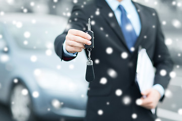 Image showing man with car key outside