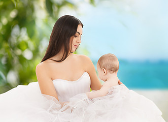 Image showing happy mother with adorable baby