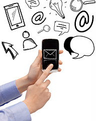 Image showing hand holding smartphone with email icon