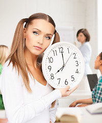 Image showing student showing clock