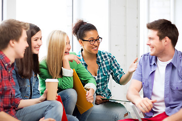 Image showing students communicating and laughing at school