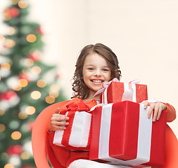 Image showing happy child girl with gift boxes