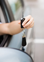 Image showing man with car key outside