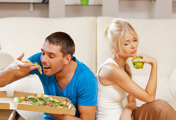 Image showing couple eating different food