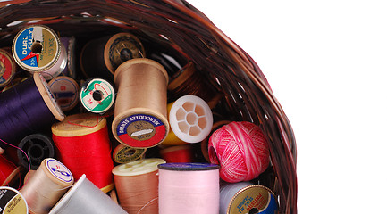 Image showing Sewing Thread In A Wicker Basket