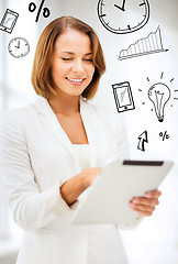 Image showing businesswoman with tablet pc in office