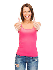 Image showing woman in blank pink tank top showing thumbs up