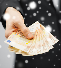 Image showing man in suit with euro cash money