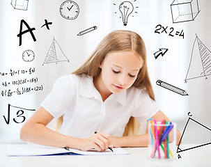 Image showing little student girl drawing at school