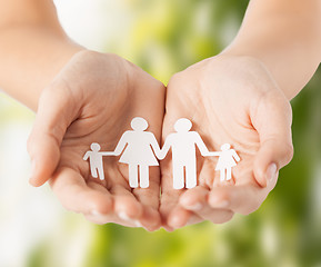 Image showing womans hands with paper man family