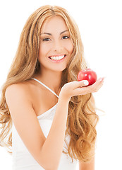 Image showing smiling woman with red apple