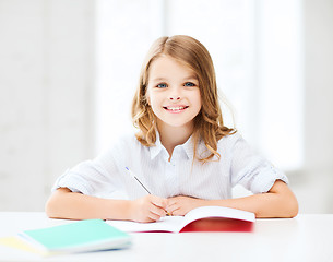 Image showing student girl studying at school