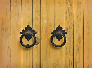 Image showing Wooden door with round handles