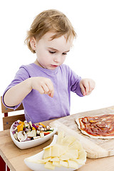 Image showing homemade pizza by a cute little girl