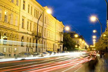 Image showing editorial night scene boulevard car tram light streaks historic 
