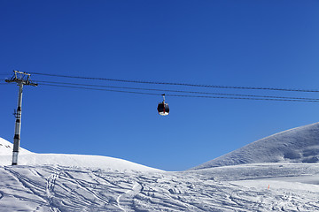Image showing Gondola lift and off piste slope at nice day