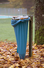 Image showing autumn scenery with refuse sack