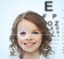 Image showing girl with eyesight testing board