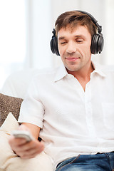 Image showing man with headphones listening to music