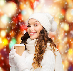 Image showing woman in hat with takeaway tea or coffee cup