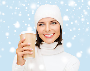 Image showing woman in hat with takeaway tea or coffee cup