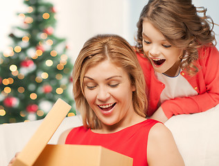 Image showing happy mother and child girl with gift box