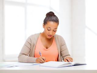 Image showing international student studying in college