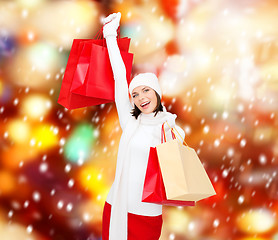 Image showing picture of happy woman with shopping bags