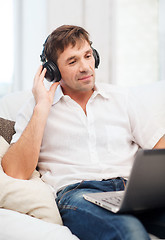 Image showing man with headphones listening to music