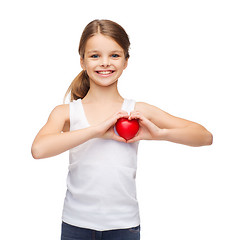 Image showing girl in blank white shirt with small red heart