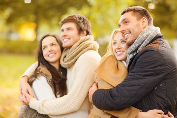 Image showing group of friends having fun in autumn park