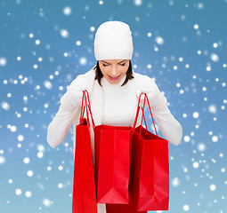 Image showing picture of happy woman with shopping bags