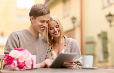 Image showing couple with tablet pc in cafe