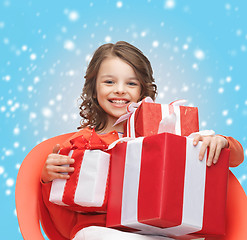 Image showing happy child girl with gift boxes