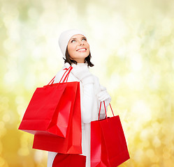 Image showing picture of happy woman with shopping bags