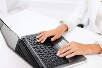 Image showing businesswoman using her laptop computer