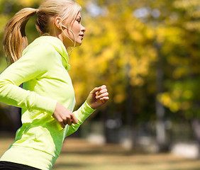 Image showing woman doing running outdoors