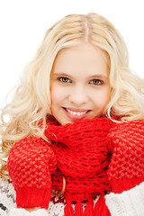 Image showing teenage girl in red mittens and scarf