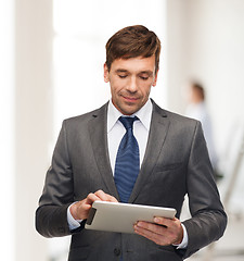 Image showing buisnessman with tablet pc