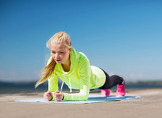 Image showing woman doing sports outdoors