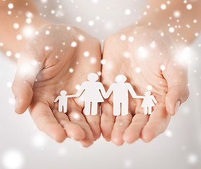 Image showing woman hands with paper man family