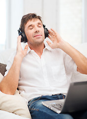 Image showing man with headphones listening to music