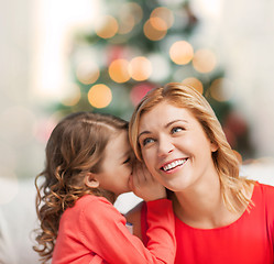 Image showing mother and daughter whispering gossip