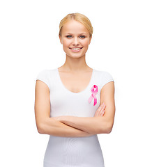 Image showing woman in blank t-shirt with pink cancer ribbon