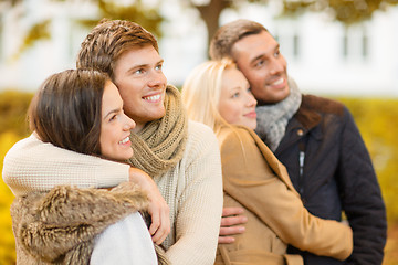 Image showing group of friends having fun in autumn park