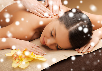 Image showing woman in spa salon getting massage