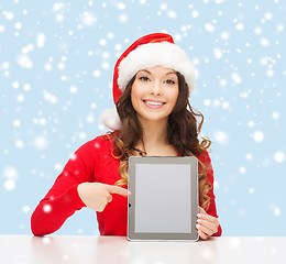 Image showing woman in santa helper hat with tablet pc