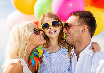 Image showing family with colorful balloons