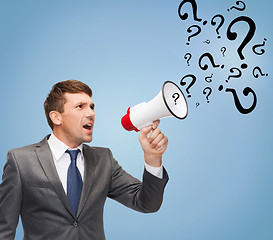 Image showing buisnessman with bullhorn or megaphone